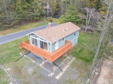 CHARMING UPGRADED POCONOS CHALET Completely Updated 3BR 2.5BA on Pocono Farms Country Club in Pennsylvania - for sale on GolfHomes.com, golf home, golf lot
