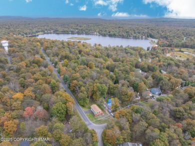 CHARMING UPGRADED POCONOS CHALET Completely Updated 3BR 2.5BA on Pocono Farms Country Club in Pennsylvania - for sale on GolfHomes.com, golf home, golf lot