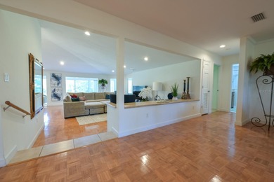 Experience refined living in this beautifully appointed on  in Florida - for sale on GolfHomes.com, golf home, golf lot