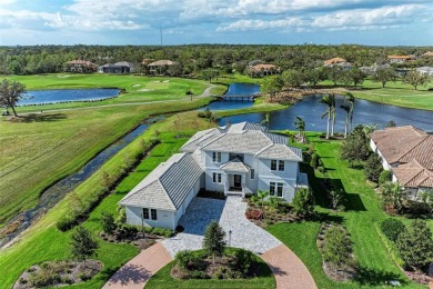 Stunning lake and golf course views are the backdrop for this on The Founders Golf Club in Florida - for sale on GolfHomes.com, golf home, golf lot