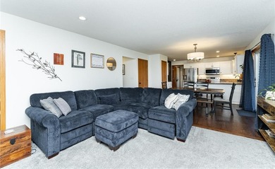 This 3-bed, 4-bath home on a full acre corner lot will not on Zumbro Valley Golf Club in Minnesota - for sale on GolfHomes.com, golf home, golf lot