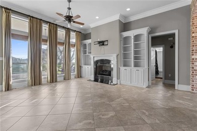 Enjoy serene water and golf course views from this exceptional on Oak Harbor Golf Club in Louisiana - for sale on GolfHomes.com, golf home, golf lot