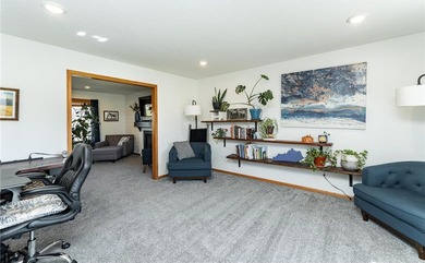 This 3-bed, 4-bath home on a full acre corner lot will not on Zumbro Valley Golf Club in Minnesota - for sale on GolfHomes.com, golf home, golf lot