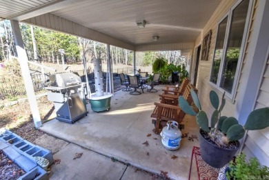 This delightful one-level residence offers a perfect blend of on Indian Hills Country Club in Arkansas - for sale on GolfHomes.com, golf home, golf lot