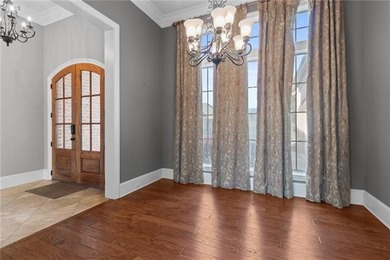 Enjoy serene water and golf course views from this exceptional on Oak Harbor Golf Club in Louisiana - for sale on GolfHomes.com, golf home, golf lot