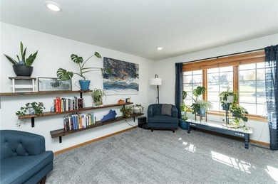 This 3-bed, 4-bath home on a full acre corner lot will not on Zumbro Valley Golf Club in Minnesota - for sale on GolfHomes.com, golf home, golf lot