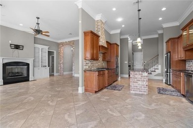 Enjoy serene water and golf course views from this exceptional on Oak Harbor Golf Club in Louisiana - for sale on GolfHomes.com, golf home, golf lot