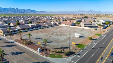 Prime 1.67-acre commercial corner lot with over 300 feet of on Desert Lakes Golf Course in Arizona - for sale on GolfHomes.com, golf home, golf lot