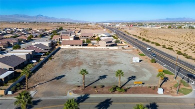 Prime 1.67-acre commercial corner lot with over 300 feet of on Desert Lakes Golf Course in Arizona - for sale on GolfHomes.com, golf home, golf lot