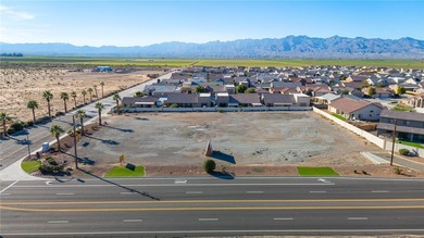 Prime 1.67-acre commercial corner lot with over 300 feet of on Desert Lakes Golf Course in Arizona - for sale on GolfHomes.com, golf home, golf lot
