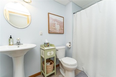 This 3-bed, 4-bath home on a full acre corner lot will not on Zumbro Valley Golf Club in Minnesota - for sale on GolfHomes.com, golf home, golf lot