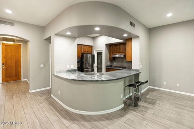 Spectacular Ground-Floor Villa in the Exclusive, Gated on SunRidge Canyon Golf Club in Arizona - for sale on GolfHomes.com, golf home, golf lot