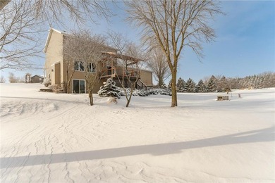 This 3-bed, 4-bath home on a full acre corner lot will not on Zumbro Valley Golf Club in Minnesota - for sale on GolfHomes.com, golf home, golf lot
