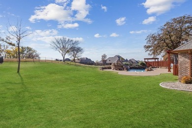 Welcome to this stunning, remodeled home located in the 24-7 on The Golf Club at Resort Eagle Mountain Lake in Texas - for sale on GolfHomes.com, golf home, golf lot