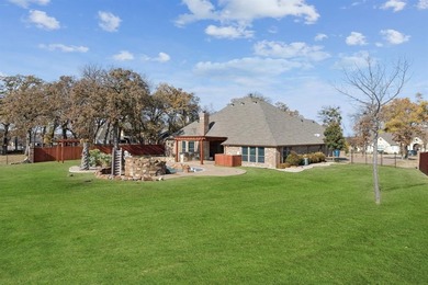 Welcome to this stunning, remodeled home located in the 24-7 on The Golf Club at Resort Eagle Mountain Lake in Texas - for sale on GolfHomes.com, golf home, golf lot