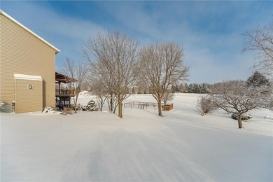 This 3-bed, 4-bath home on a full acre corner lot will not on Zumbro Valley Golf Club in Minnesota - for sale on GolfHomes.com, golf home, golf lot