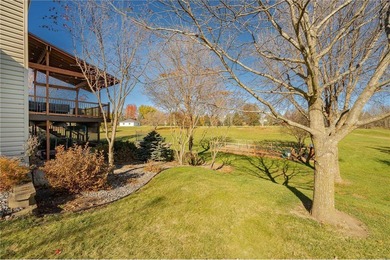 This 3-bed, 4-bath home on a full acre corner lot will not on Zumbro Valley Golf Club in Minnesota - for sale on GolfHomes.com, golf home, golf lot