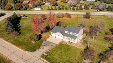 This 3-bed, 4-bath home on a full acre corner lot will not on Zumbro Valley Golf Club in Minnesota - for sale on GolfHomes.com, golf home, golf lot