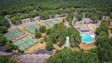 This delightful one-level residence offers a perfect blend of on Indian Hills Country Club in Arkansas - for sale on GolfHomes.com, golf home, golf lot