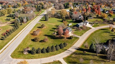 This 3-bed, 4-bath home on a full acre corner lot will not on Zumbro Valley Golf Club in Minnesota - for sale on GolfHomes.com, golf home, golf lot