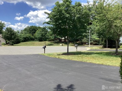 Nestled on a tree-lined cul-de-sac in the desirable 55+ on Concordia Golf Club in New Jersey - for sale on GolfHomes.com, golf home, golf lot