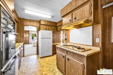 Step back in time to this original manufactured home in the on Palm Desert Greens Country Club in California - for sale on GolfHomes.com, golf home, golf lot