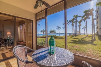 Enjoy panoramic vistas of the glistening bay from your private on Isla Del Sol Yacht and Country Club in Florida - for sale on GolfHomes.com, golf home, golf lot