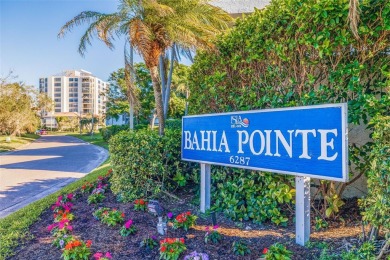 Enjoy panoramic vistas of the glistening bay from your private on Isla Del Sol Yacht and Country Club in Florida - for sale on GolfHomes.com, golf home, golf lot