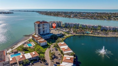 Enjoy panoramic vistas of the glistening bay from your private on Isla Del Sol Yacht and Country Club in Florida - for sale on GolfHomes.com, golf home, golf lot