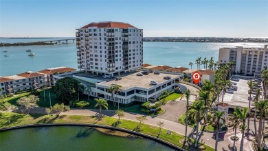 Enjoy panoramic vistas of the glistening bay from your private on Isla Del Sol Yacht and Country Club in Florida - for sale on GolfHomes.com, golf home, golf lot