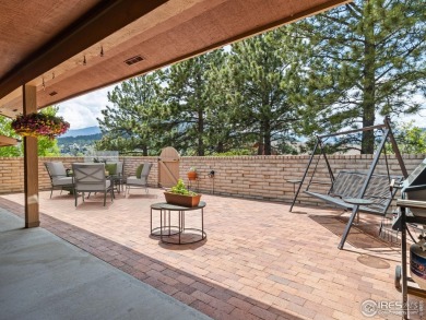 Easy living at Vista Lane! Drop off your groceries & hit the on Lake Estes Golf Course in Colorado - for sale on GolfHomes.com, golf home, golf lot