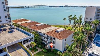 Enjoy panoramic vistas of the glistening bay from your private on Isla Del Sol Yacht and Country Club in Florida - for sale on GolfHomes.com, golf home, golf lot