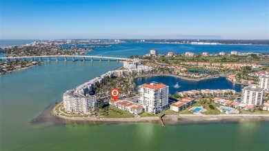 Enjoy panoramic vistas of the glistening bay from your private on Isla Del Sol Yacht and Country Club in Florida - for sale on GolfHomes.com, golf home, golf lot