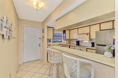 Exceptional and lovingly maintained second floor condo with on Capri Isle Golf Club in Florida - for sale on GolfHomes.com, golf home, golf lot