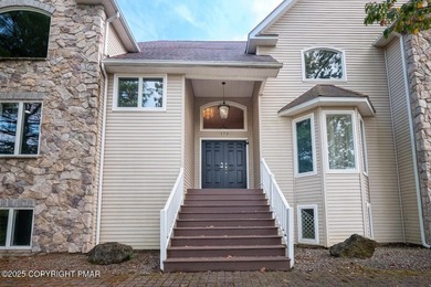 Welcome to your ultimate Poconos retreat!This magnificent on Country Club of the Poconos Golf Course in Pennsylvania - for sale on GolfHomes.com, golf home, golf lot