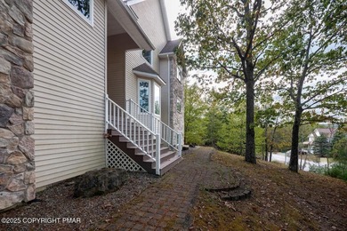 Welcome to your ultimate Poconos retreat!This magnificent on Country Club of the Poconos Golf Course in Pennsylvania - for sale on GolfHomes.com, golf home, golf lot