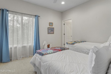 Stunning 4-bedroom, 3-bath home nestled right on the golf course on The Oaks Golf Club in Mississippi - for sale on GolfHomes.com, golf home, golf lot