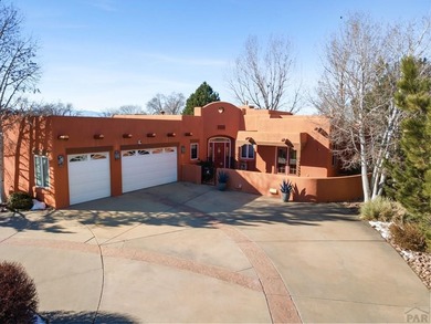 Experience true Southwest elegance in this Adobe-style home on Desert Hawk At Pueblo West in Colorado - for sale on GolfHomes.com, golf home, golf lot