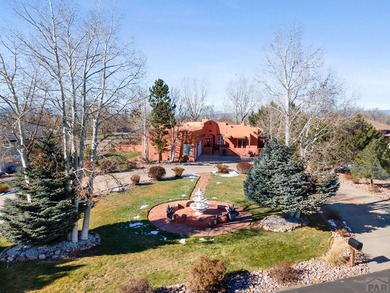 Experience true Southwest elegance in this Adobe-style home on Desert Hawk At Pueblo West in Colorado - for sale on GolfHomes.com, golf home, golf lot