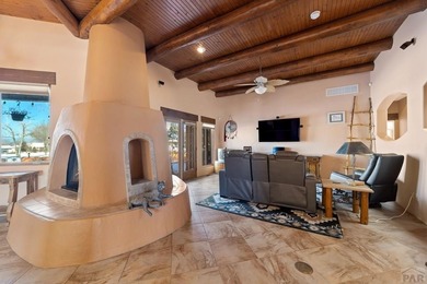 Experience true Southwest elegance in this Adobe-style home on Desert Hawk At Pueblo West in Colorado - for sale on GolfHomes.com, golf home, golf lot