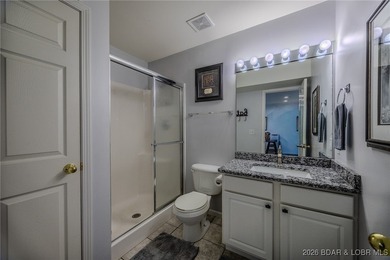 Top floor 2-bedroom loft unit spanning over 1400sqft and even on Lake Valley Country Club in Missouri - for sale on GolfHomes.com, golf home, golf lot