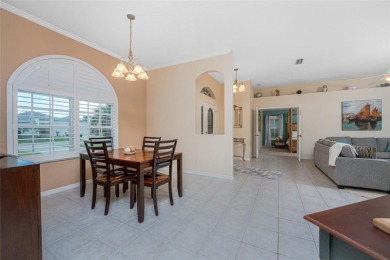 Enjoy serene waterfront living in this immaculate 3-bedroom, 2 on Pinemoor West Golf Club in Florida - for sale on GolfHomes.com, golf home, golf lot