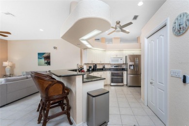 Enjoy serene waterfront living in this immaculate 3-bedroom, 2 on Pinemoor West Golf Club in Florida - for sale on GolfHomes.com, golf home, golf lot