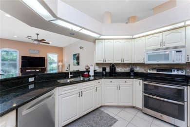 Enjoy serene waterfront living in this immaculate 3-bedroom, 2 on Pinemoor West Golf Club in Florida - for sale on GolfHomes.com, golf home, golf lot