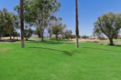 Sweeping golf course and mountain views! Situated in a prime on Desert Falls Country Club in California - for sale on GolfHomes.com, golf home, golf lot