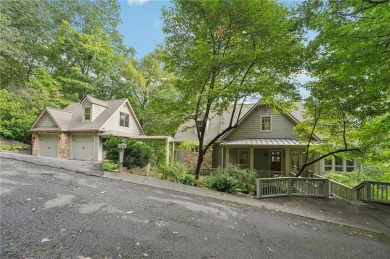 Nestled at the end of a quiet cul-de-sac, this five-bedroom on Big Canoe Golf Club - Cherokee in Georgia - for sale on GolfHomes.com, golf home, golf lot