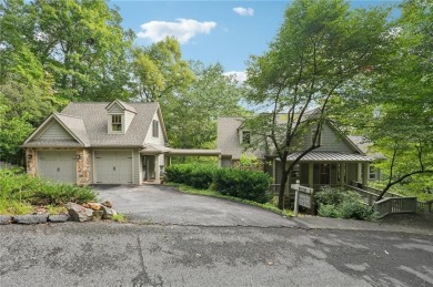 Nestled at the end of a quiet cul-de-sac, this five-bedroom on Big Canoe Golf Club - Cherokee in Georgia - for sale on GolfHomes.com, golf home, golf lot