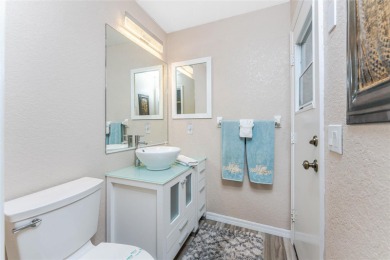 Enjoy serene waterfront living in this immaculate 3-bedroom, 2 on Pinemoor West Golf Club in Florida - for sale on GolfHomes.com, golf home, golf lot