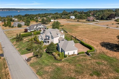 Perched above the waters of Narragansett Bay, this custom-built on Carnegie Abbey Club in Rhode Island - for sale on GolfHomes.com, golf home, golf lot