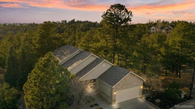 Exquisitely located on the edge of 11 acres of HOA owned forest on The Ridge At Castle Pines North in Colorado - for sale on GolfHomes.com, golf home, golf lot